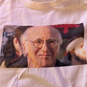 Larry David white tee